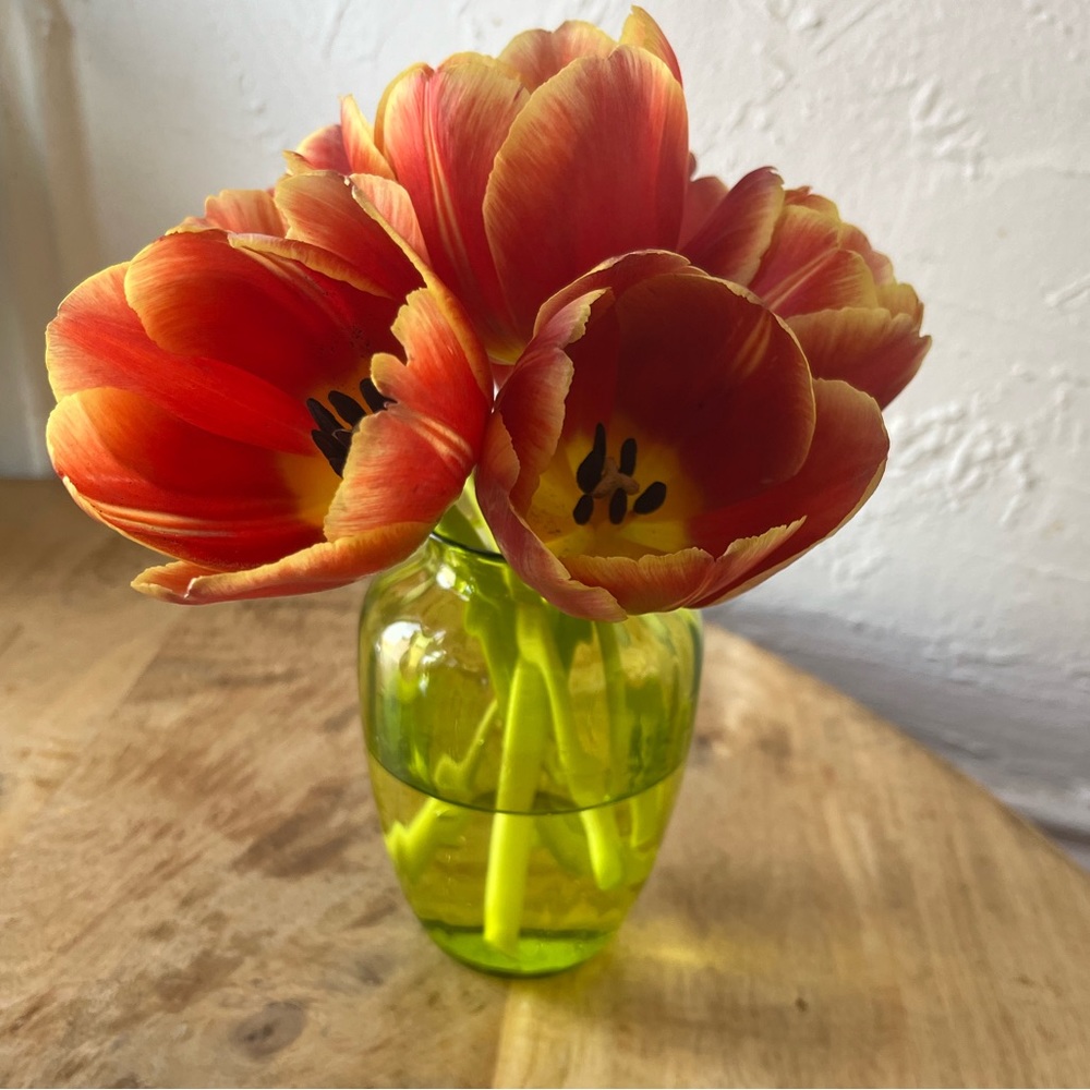 Authentic Baccarat crystal mini vase in light green.